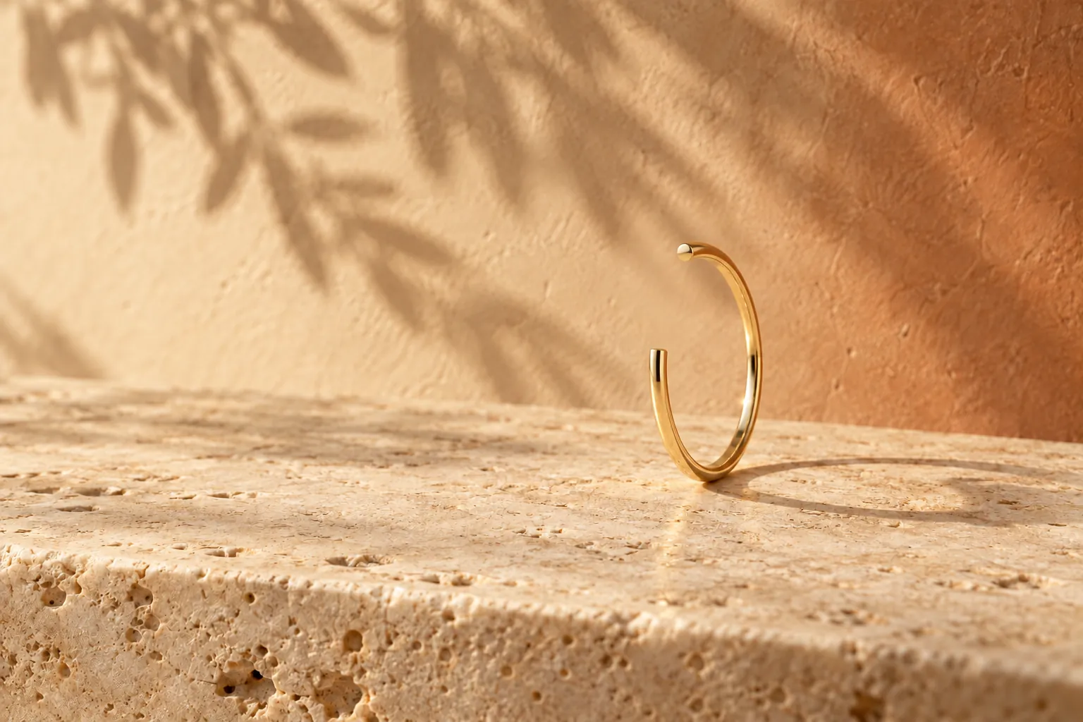A gold wire curling into a circle