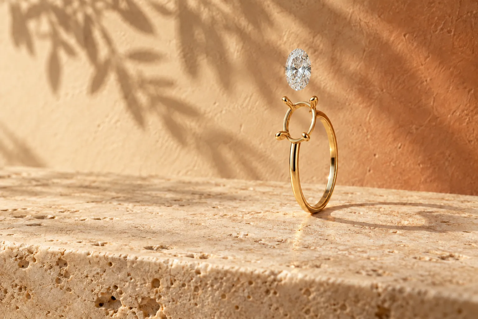 An oval diamond above the claws