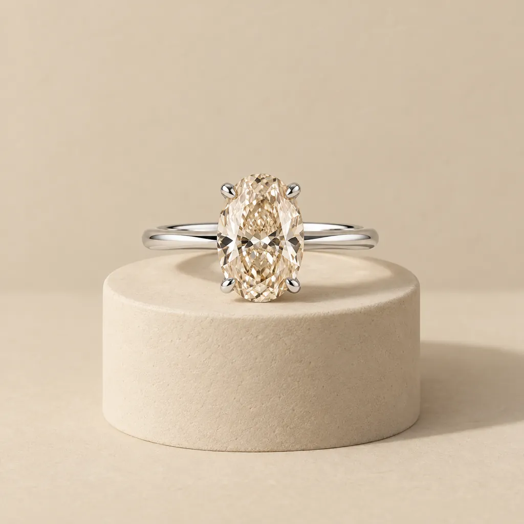 Aube ring in white gold with a champagne diamond